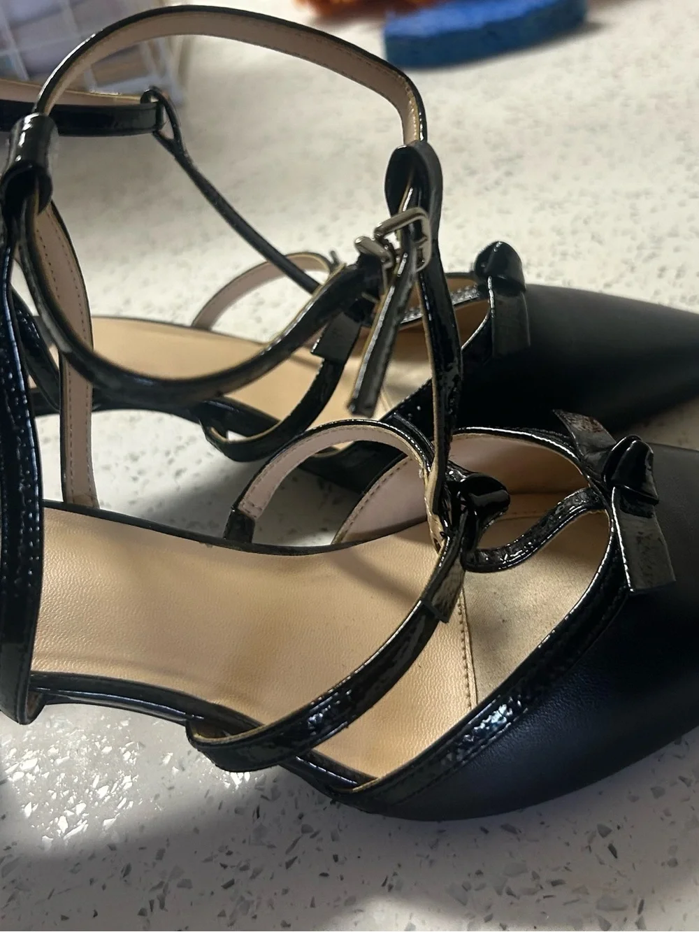 Alex Marie Black Pointed-Toe T-Strap Heels with Bow Accent